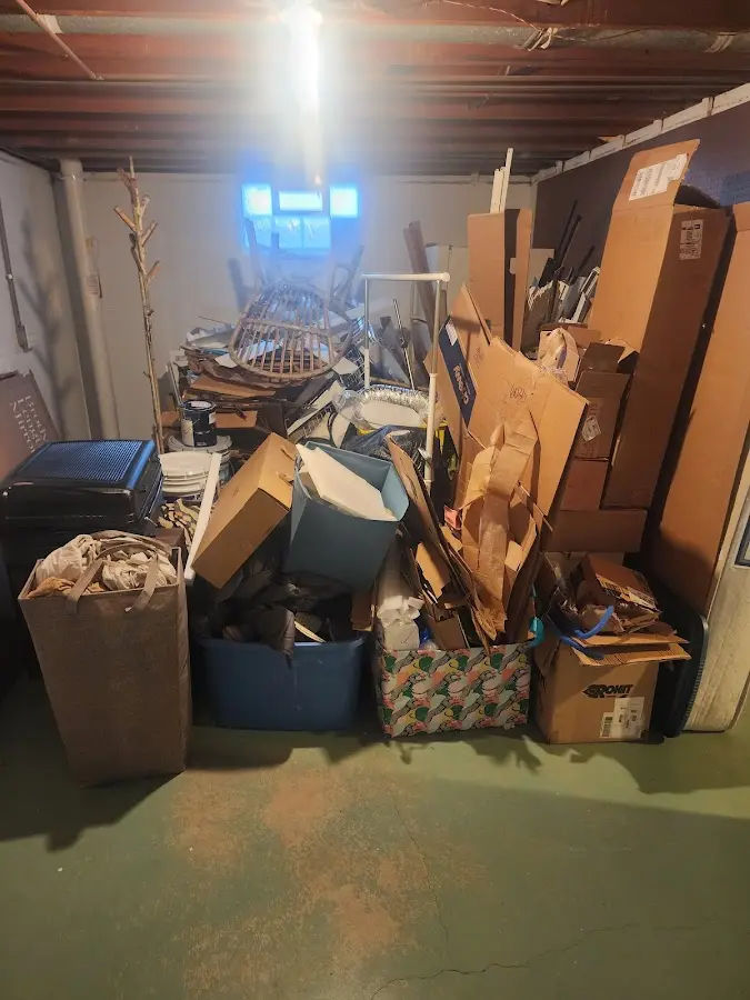 Roll-off dumpster container at job site for 15 Yard Dumpster Rental in Hempstead